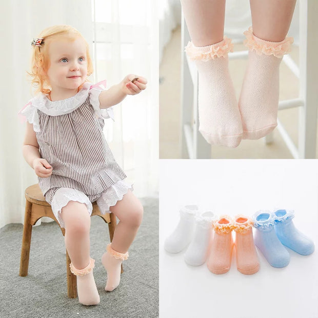 Girl's soft cotton socks with lace ruffle detail. Slip resistant. 3 pack.