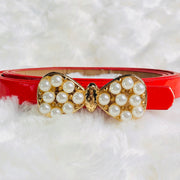 Girl's Pearl embellished bow detail belt. Red.