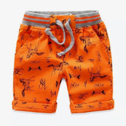 Boy's all over print Twill Shorts. Orange.